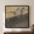 Edgar Degas — Dancers Practicing at the Barre — framed canvas print, shown on a wall