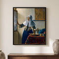 Johannes Vermeer — Young Woman with a Water Pitcher — framed canvas print, shown on a wall